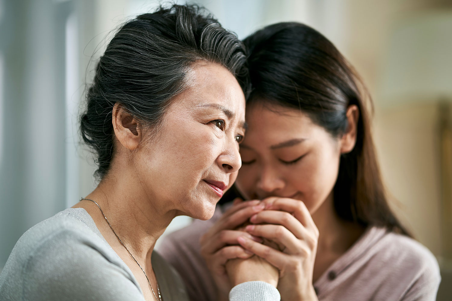 mother allficted with Alzheimer's disease with daughter who is caregiver offering support