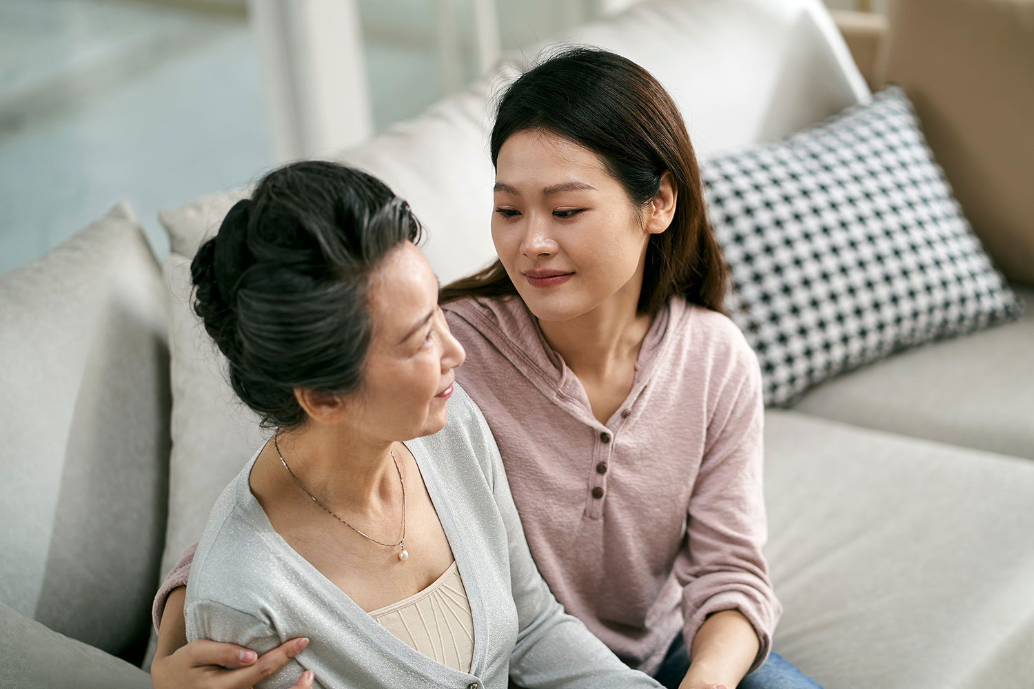caregiver daughter with memory care mother who is a patient - practical tips for Alzheimer's care