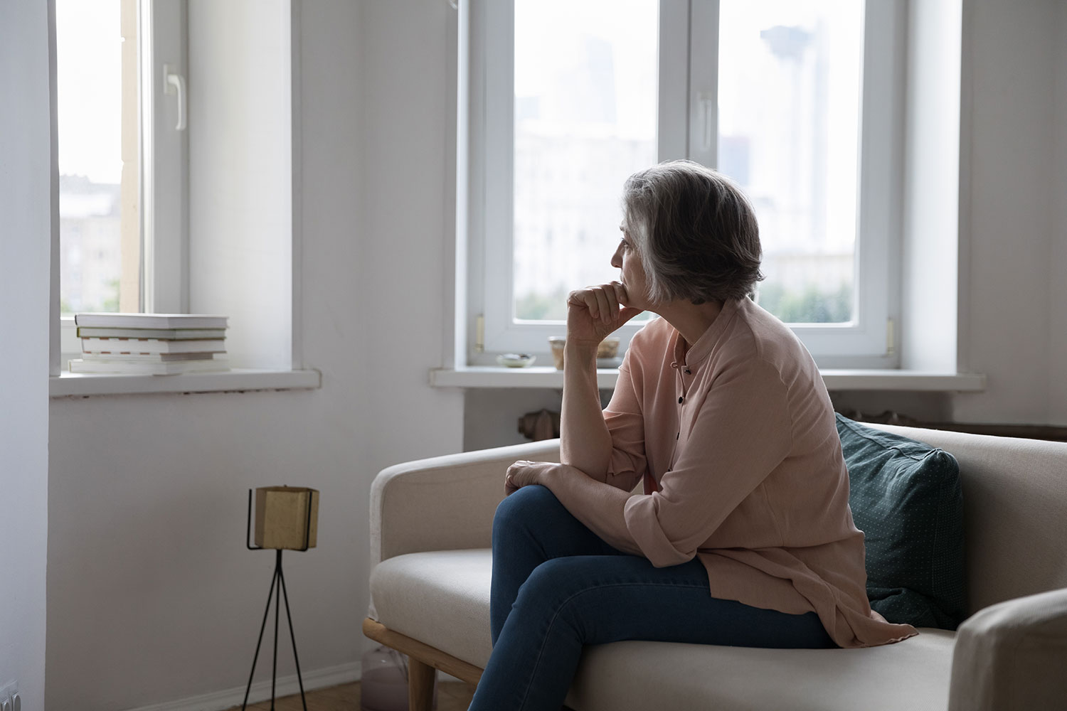 woman wondering about early detection and prevention of caregiver daughter with memory care mother who is a patient - practical tips for Alzheimer's disease or Dementia